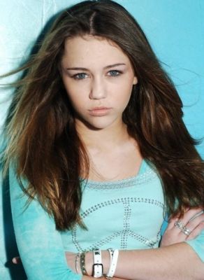 This is Miley in a peace shirt - Society - People - All About Miley Cyrus/Ha...